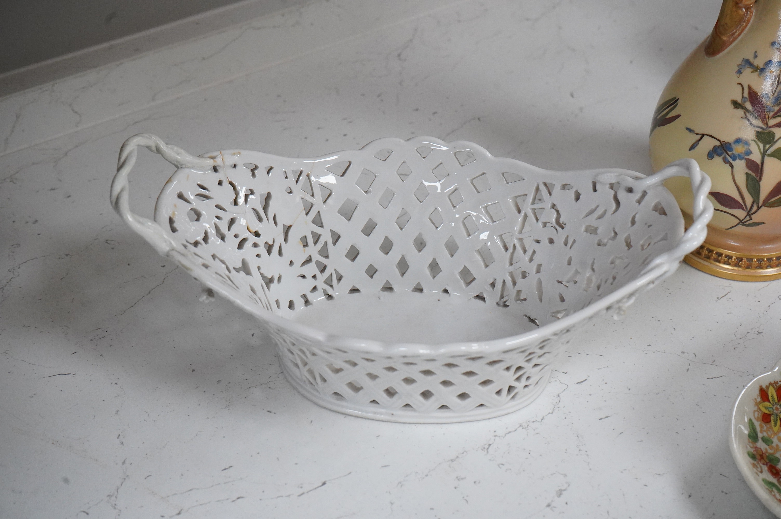 A 19th century Derby tureen and cover, a pair of Royal Worcester blush vase-26cm high, a Belleek basket and cover, a Wedgwood blue Jasperware cheese dish and associated cover, two continental baskets and vase. (7).